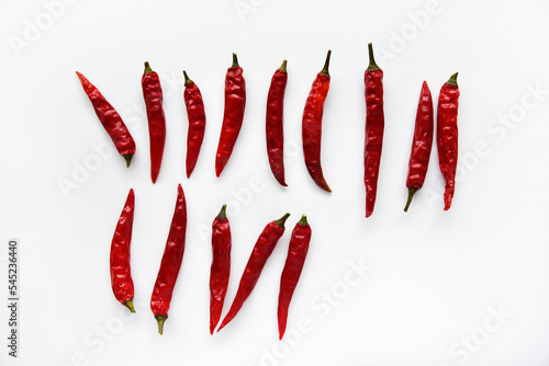Red hot capsicum on a white background. Red pepper close-up.
