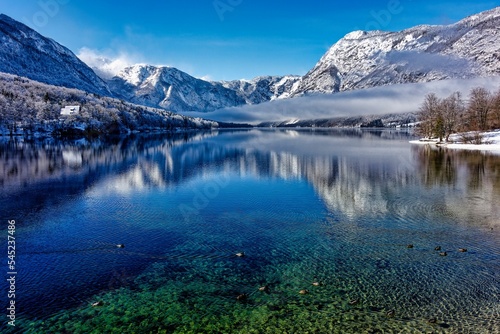 Beautiful view of the lake near the mountains during winter