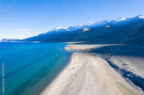 Aerial landscape of Pangong Lake and mountains with clear blue sky, it's a highest saline water lake in Himalayas range, landmarks and popular for tourist attractions in Leh, Ladakh, India, Asia
