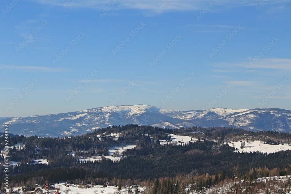 Beautiful shot of a landscape covered in snow during the day in winter Beautiful shot of a landscape covered in snow during the day in winter