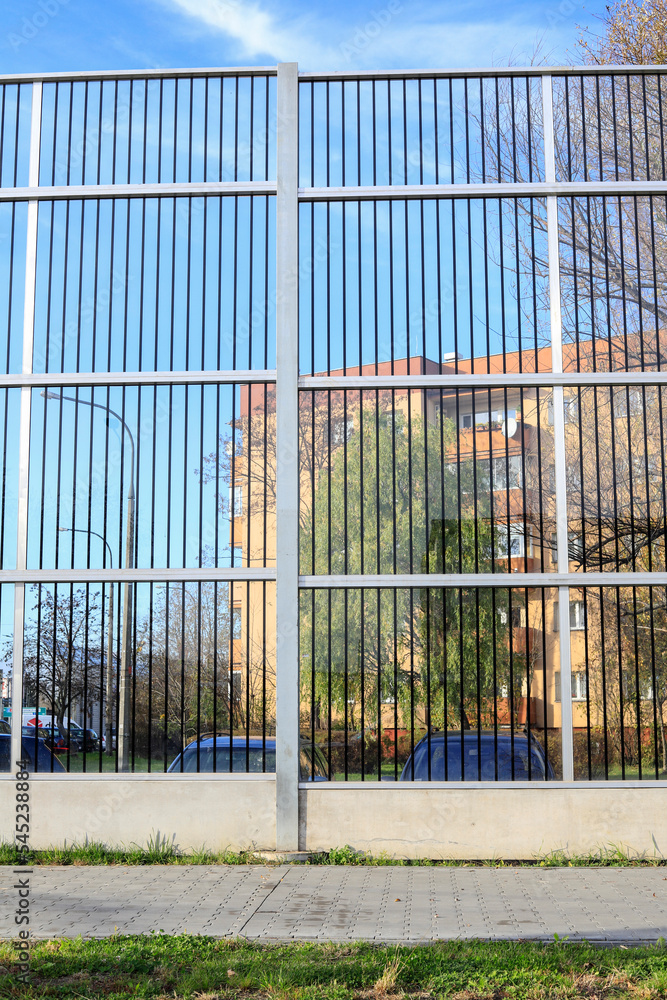 Obraz premium KRAKOW, POLAND - NOVEMBER 07,2022: Sound barriers along a noisy road in the city.