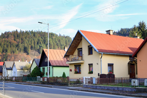 CERVENY KLASTOR, SLOVAKIA - NOVEMBER 09, 2022: Houses on the main street in the town. photo
