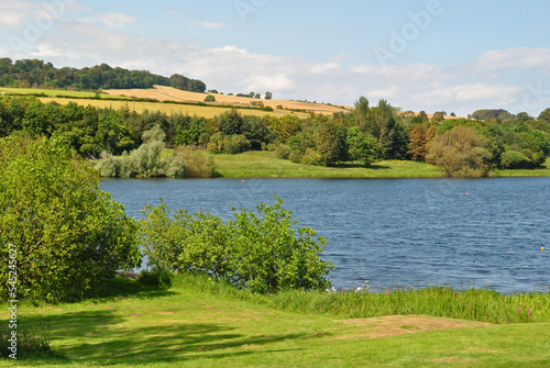 Landscape View of Lake and Hills on Sunny Day