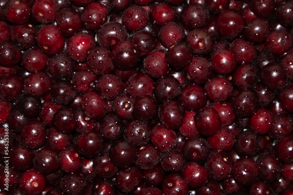 Background of red ripe cherries. View from above. Background of red ripe cherries. View from above.
