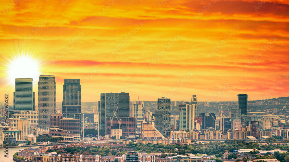 London - UK. Aerial panoramic view of Canary Wharf modern buildings at sunset