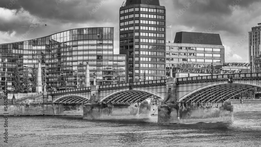 London Bridge and modern buildings over Thames River