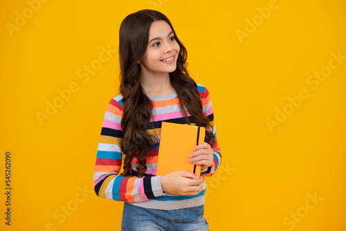 Back to school. Portrait of teenage school girl with books. Children school and education concept. Schoolgirl student. Happy teenager, positive and smiling emotions of teen girl.
