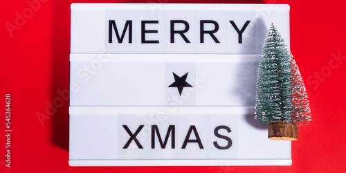 Wallpaper Mural Merry Christmas greetings on lightbox on red with ornament tree Torontodigital.ca