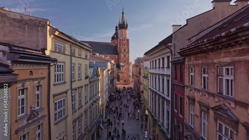 Aerial view of Floriańska Street in Cracow, Old Town, Poland. Flying over Main Market Square (Rynek Główny w Krakowie), Saint Mary's Basilica (kościół Mariacki) and  Sukiennice photo