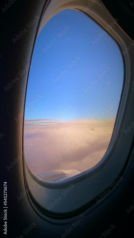 View of the clouds from the airplane window View of the clouds from the airplane window