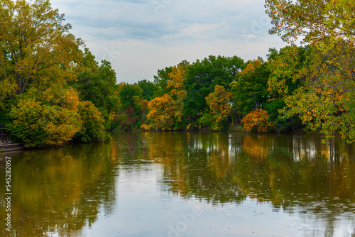 Beautiful Fall Scene Along A Calm River