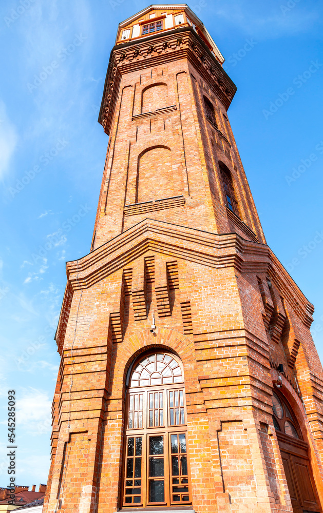 Obraz premium Old brick water tower against the sky in Staraya Russa, Russia