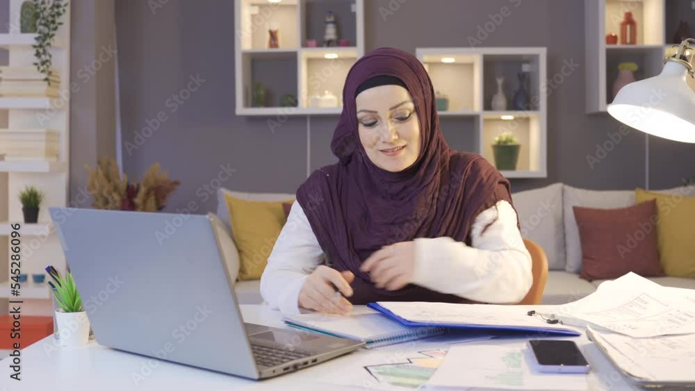 Business woman in hijab works remotely.
Muslim business woman in hijab making a video call on a laptop, looking at graphs.
Business woman in hijab works remotely.
Muslim business woman in hijab making a video call on a laptop, looking at graphs.