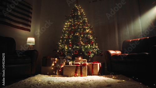 Fotografie Christmas tree in a house with sofas and white carpet