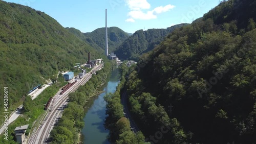 Aerial drone flyover chimney of Trbovlje power station, Slovenia photo