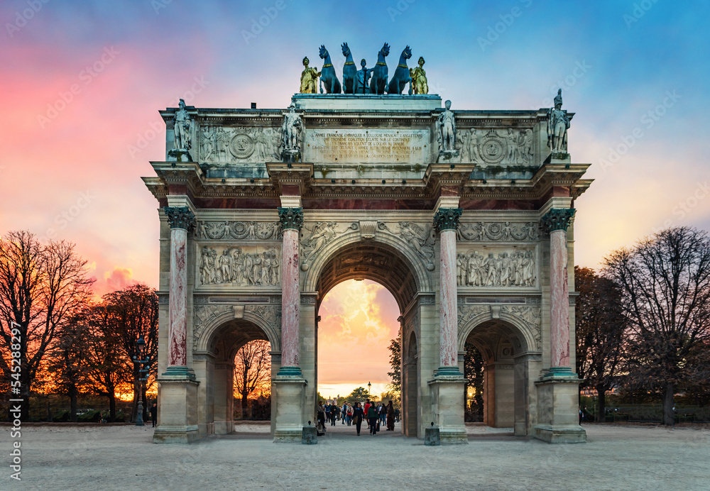 Arc de Triomphe at the Place du Carrousel in Paris. Evening view. Triumphal Arch, Paris, France. - obrazy, fototapety, plakaty 
