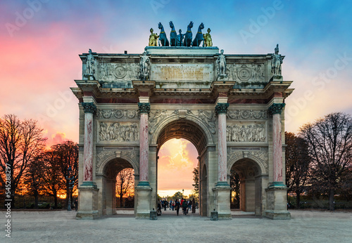 Arc de Triomphe at the Place du Carrousel in Paris. Evening view. Triumphal Arch, Paris, France. © Tryfonov