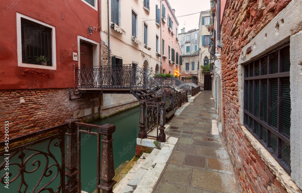 Venice. Old beautiful houses over the canal in the early morning.