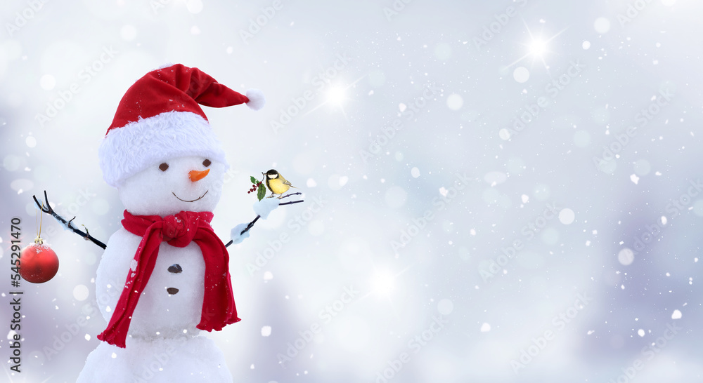 Merry christmas and happy new year greeting card with copy-space.Happy snowman standing in winter  landscape.Snow background
