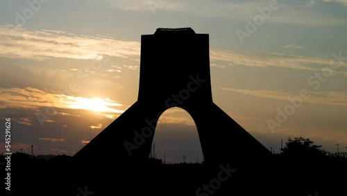 Azadi tower in Tehran, Time Lapse at Sunrise with Colorful Clouds, Iran
