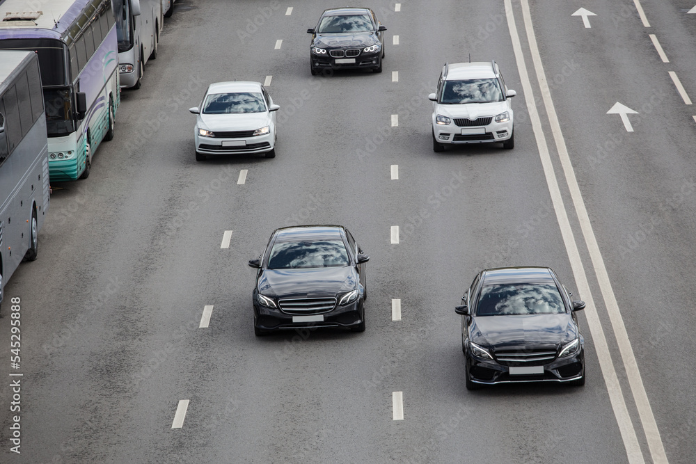 Car traffic on multi-lane highway in the city. Car traffic on multi-lane highway in the city.