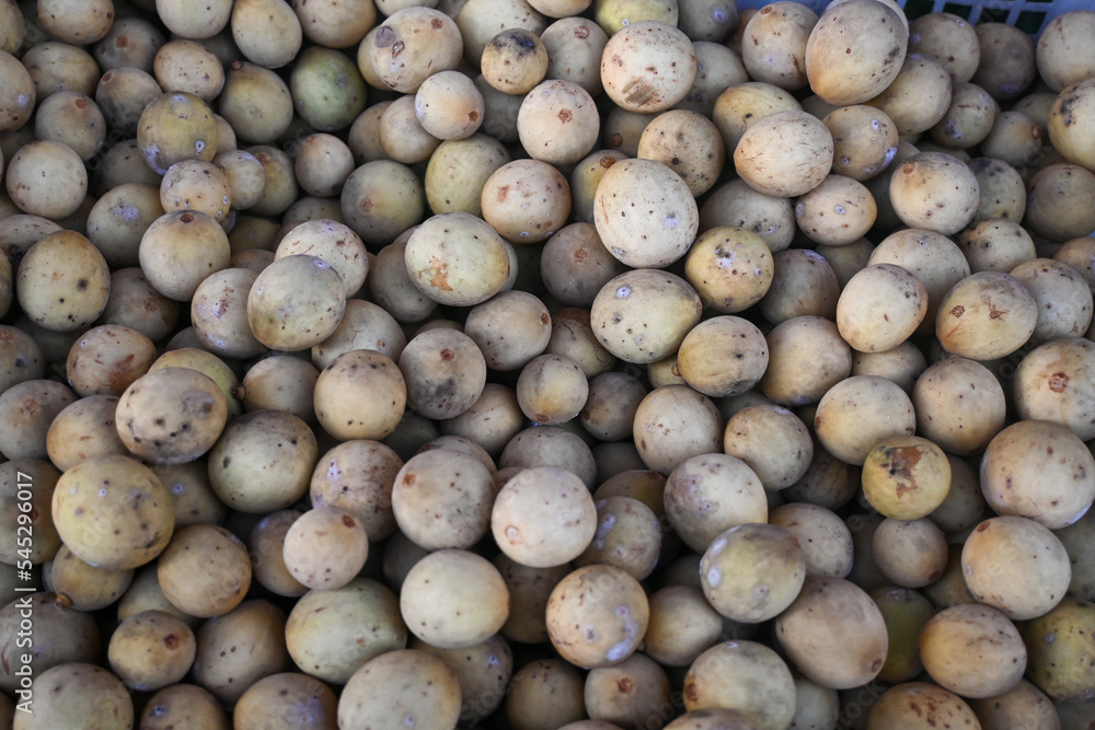 group of duku fruit (Lansium domesticum) which is sold in traditional markets in Indonesia. group of duku fruit (Lansium domesticum) which is sold in traditional markets in Indonesia.