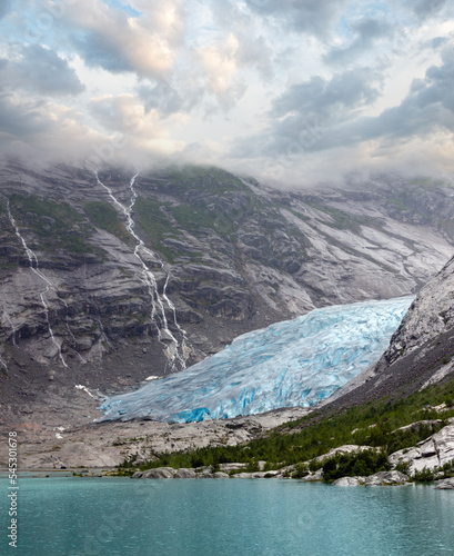 Summer overcast view to Nigardsbreen Glacier, Jostedal, Norway photo