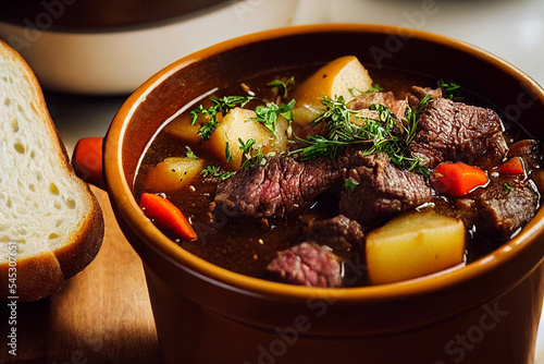 Close-up food photography of hearty Beef Stew with potato in crock pot and a side of toast