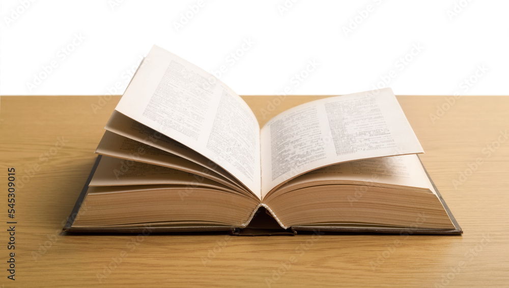 Open book on table isolated on white background Open book on table isolated on white background