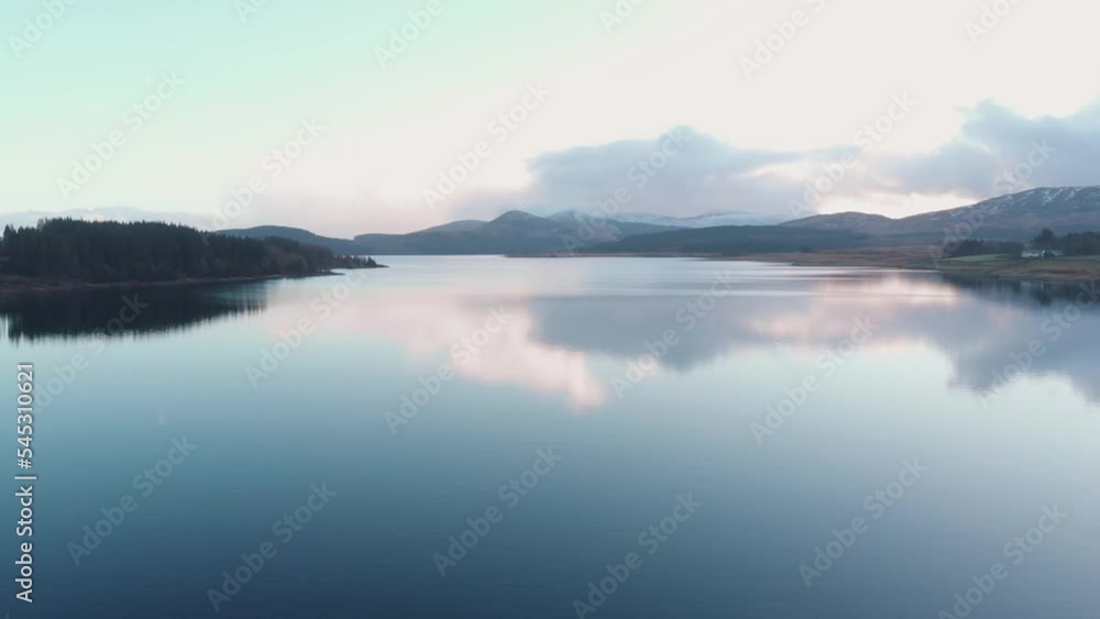 Aerial drone shot of still lake at Loch Doon, Galloway Forest Park Aerial drone shot of still lake at Loch Doon, Galloway Forest Park