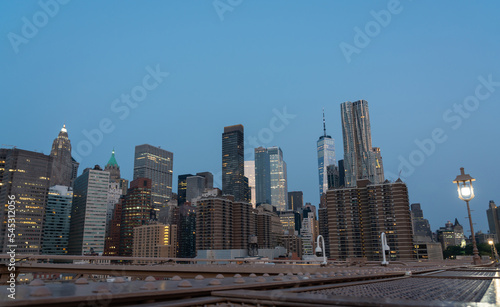 Evening panorama of New York skyscrapers  view from the Brooklyn Bridge