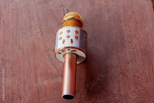 karaoke mic on wooden floor