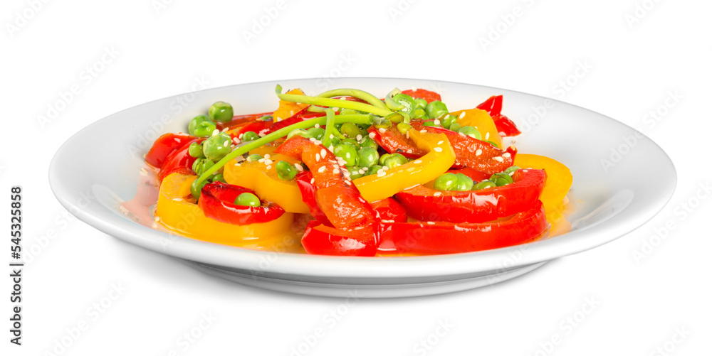Colorful vegetables salad on white plate. Red and yellow sweet peppers grilled with garlic and basil.Mediterranean  cuisine