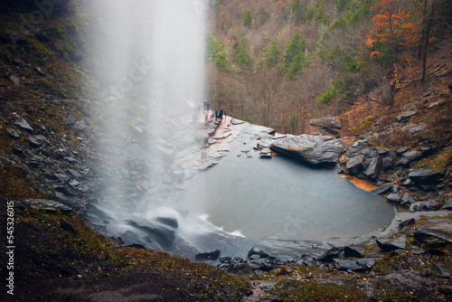 behind a waterfall