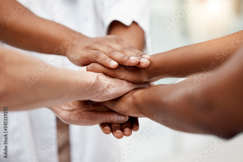Hands, community and care in trust, agreement or care for teamwork, collaboration or growth together. Hand of business people piling for partnership, unity or support in solidarity for commitment