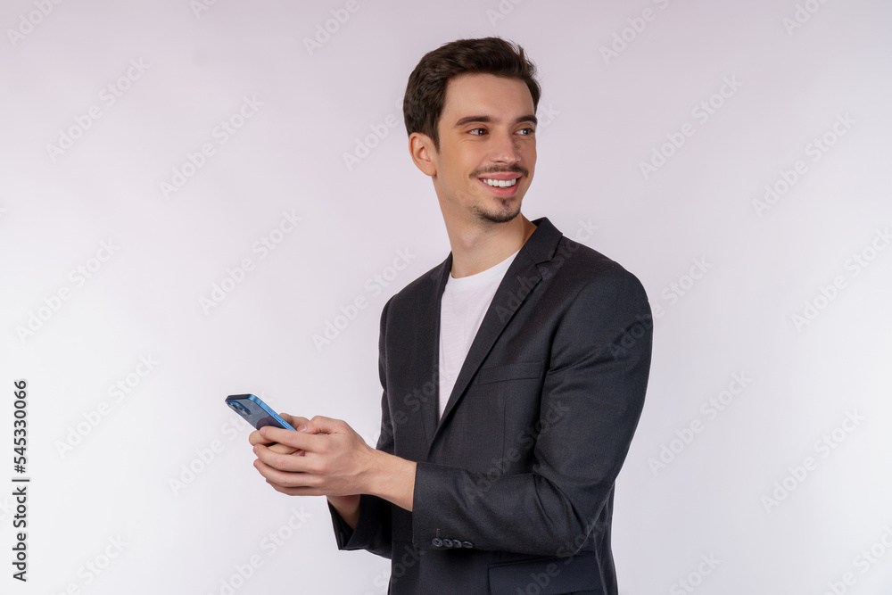 Portrait of a happy businessman using smartphone over white background Portrait of a happy businessman using smartphone over white background