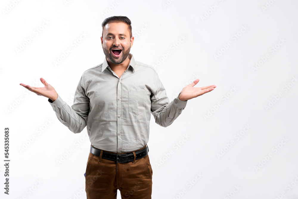 Fototapeta premium Indian man giving expression on white background.