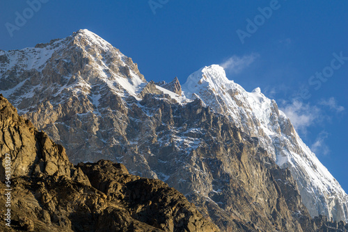 Autumn view of Karakoram mountain range of the Gilgit-Baltistan territory of Pakistan. The mountain range in Kashmir spanning the borders of Pakistan, China, and India.