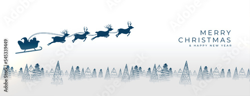 Foto merry christmas wishes banner with santa flying on reindeer sleigh