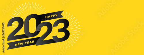 happy new year yellow banner with 2023 lettering