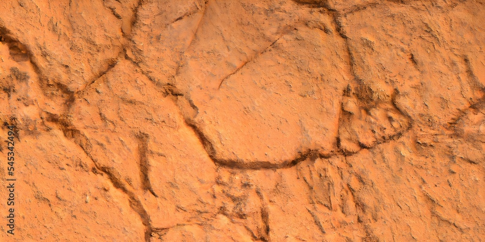 Dark brown cracked terracotta texture background