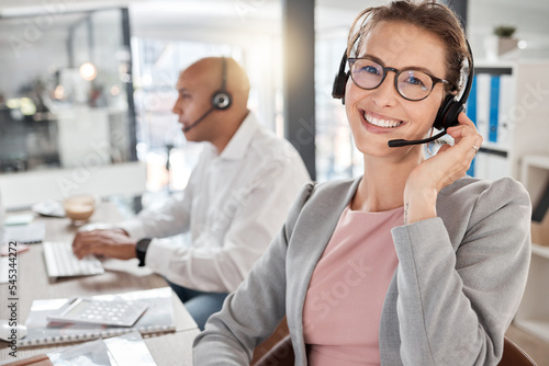 Call center, happy and consultant portrait in office for telemarketing, communication and contact us query. Working, online and customer service woman ready for call in corporate workplace. photo