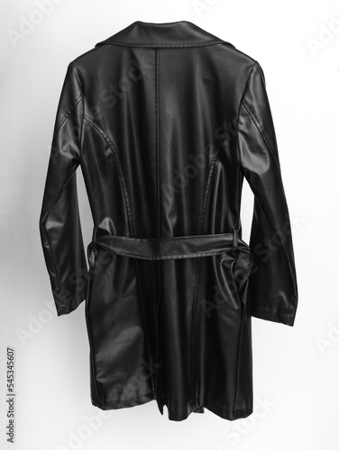 Leather black raincoat isolated on white background. Back view