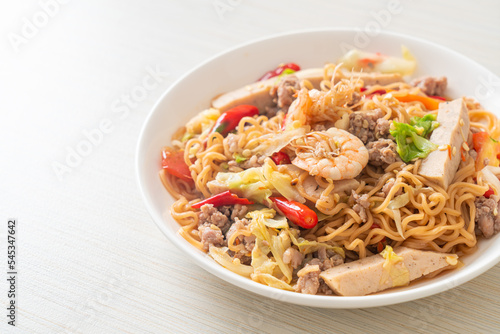 Instant noodles spicy salad on plate