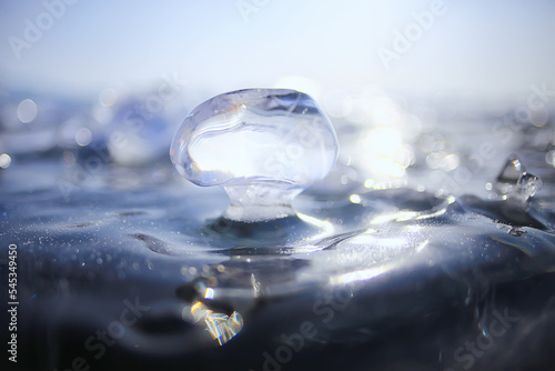 piece of ice baikal on ice  nature winter season crystal water transparent outdoor