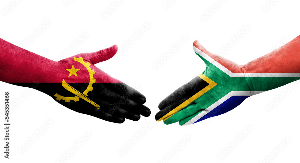 Handshake between South Africa and Angola flags painted on hands, isolated transparent image. Handshake between South Africa and Angola flags painted on hands, isolated transparent image.