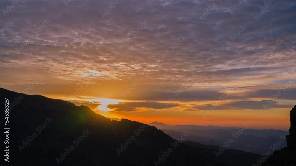 Sunrise sky 4K time lapse on the Jebel shams mountain in Oman Sunrise sky 4K time lapse on the Jebel shams mountain in Oman