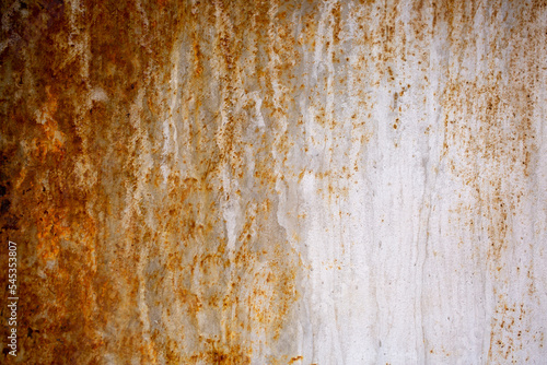 Texture of rusty iron, cracked paint on an old metal surface. Sheet of rusty metal with cracked and peeling paint, background for design with copy space.