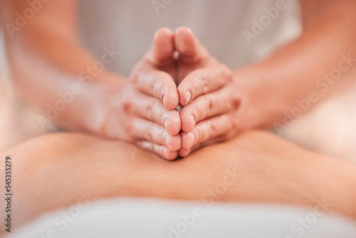 Back massage, hand and spa for a massage therapist for zen body care and beauty, health or wellness. Massueuse, physical therapy and stress relief with tranquil treatment for relaxation and wellbeing