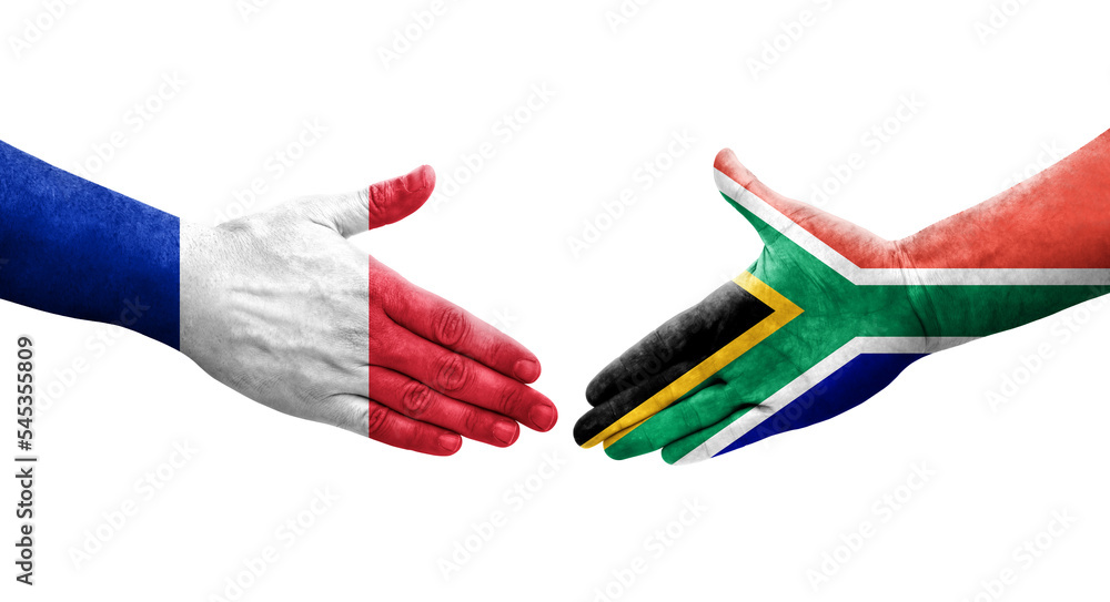Handshake between South Africa and France flags painted on hands, isolated transparent image. Handshake between South Africa and France flags painted on hands, isolated transparent image.